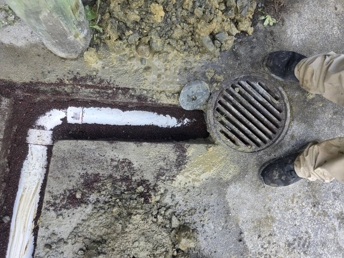 New stormwater pipe laid from a carport downpipe into the existing cesspit