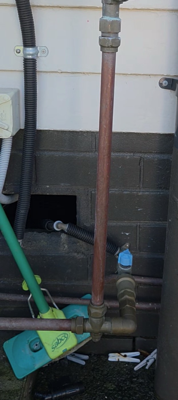 Brass fittings on the pipework at a cylinder connection