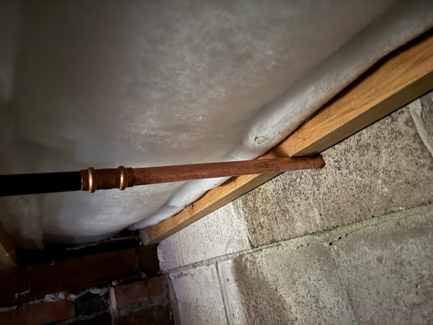 Milford: a leak under the house, and what old plumbing is telling you